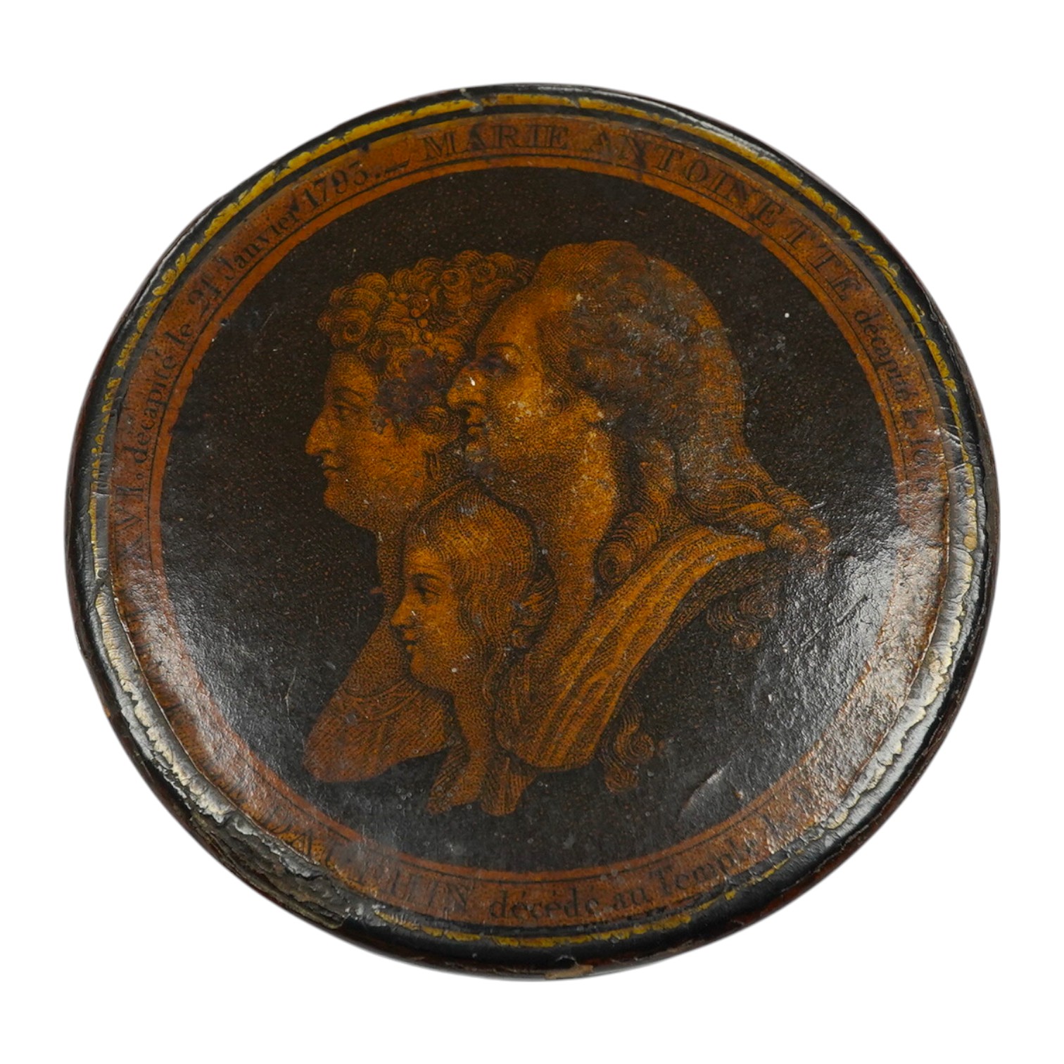 Death of Louis XVI and Marie Antoinette, a commemorative papier mache snuff box, 9cm diameter. Condition - some chipping and wear to edges, part of rim of cover missing